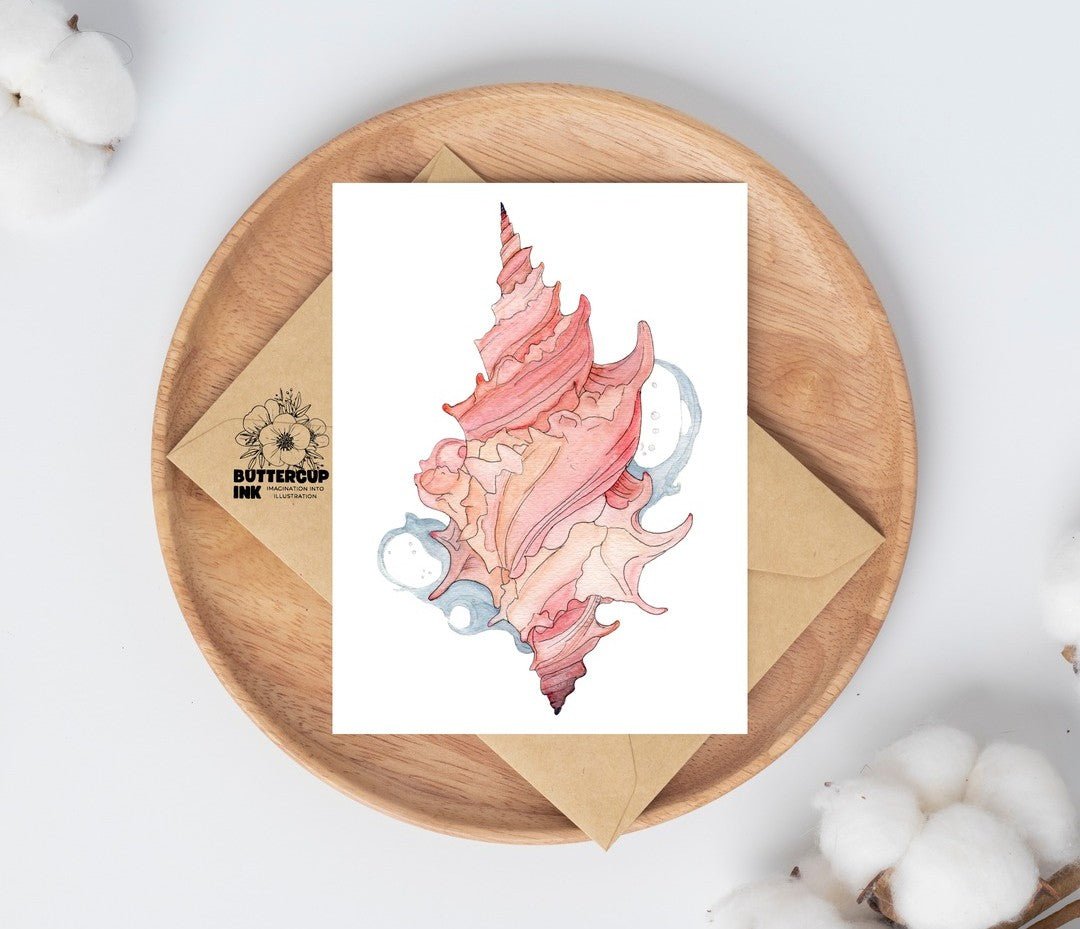 Maui Shell Study watercolor greeting card on a wooden plate with kraft envelope