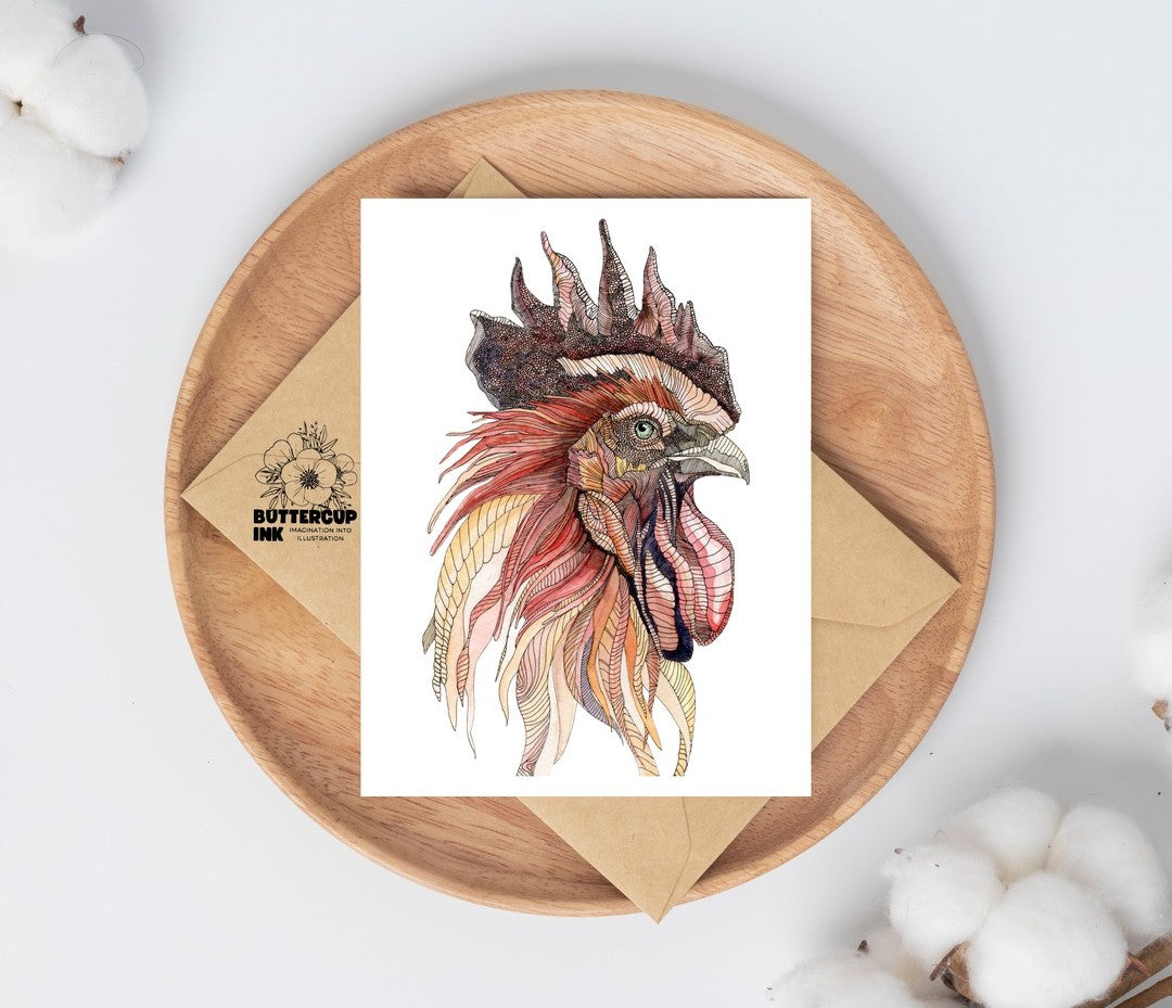Rooster watercolor greeting card on a wooden plate with kraft envelope