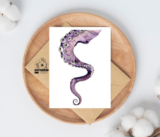 Tentacle watercolor greeting card on a wooden plate with kraft envelope